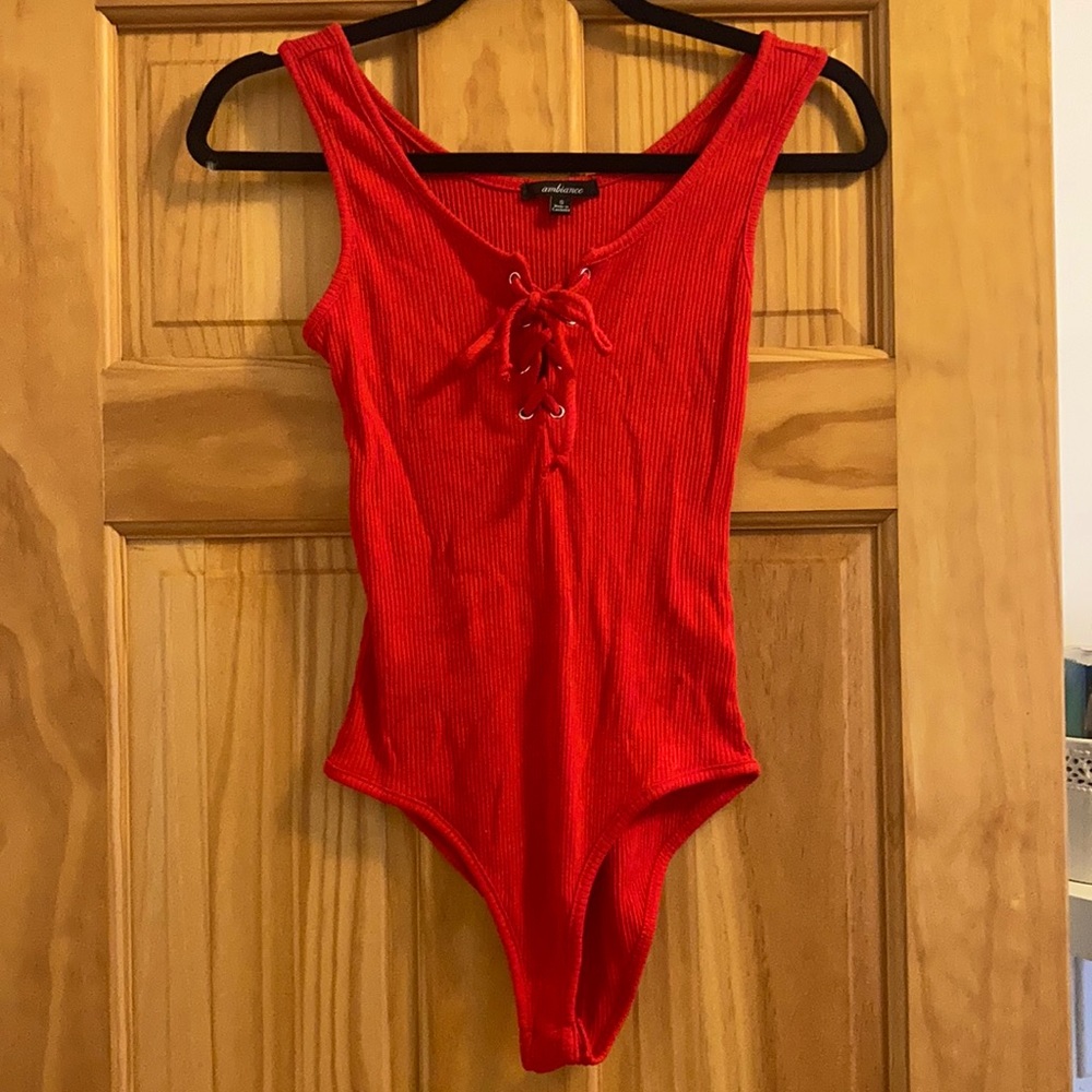 Red crisscross tie bodysuit